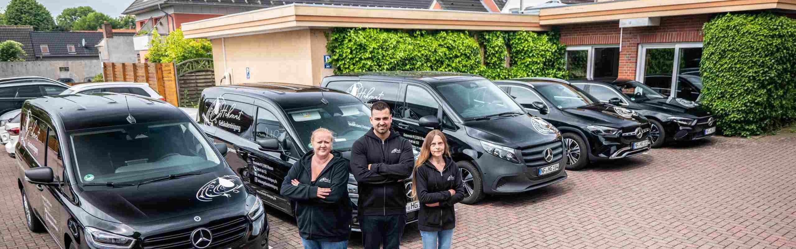 Firmenautos und Team von Hekmat Gebaeudereinigung in Husum.